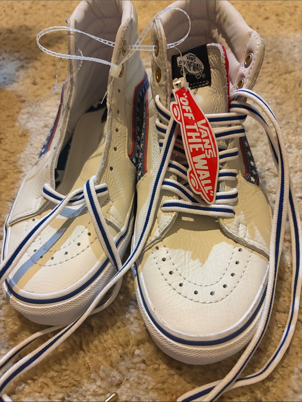Vans White High Top Sneakers with Blue and Red Details